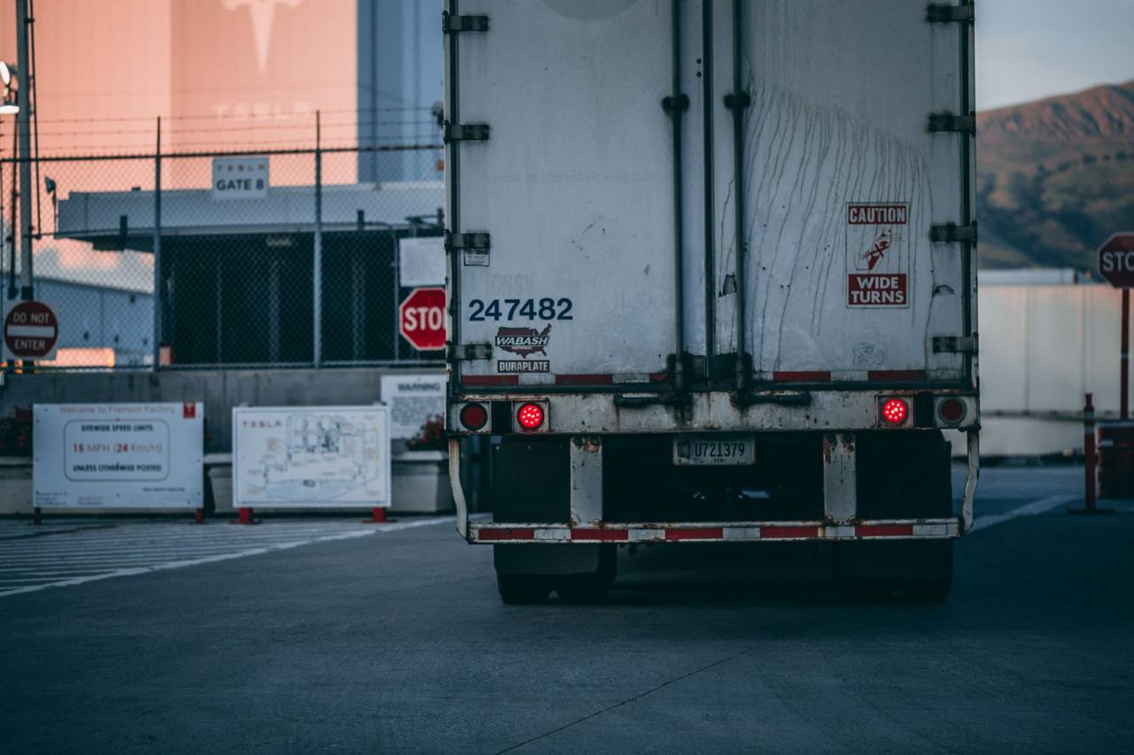 Semi truck parked at a loading dock